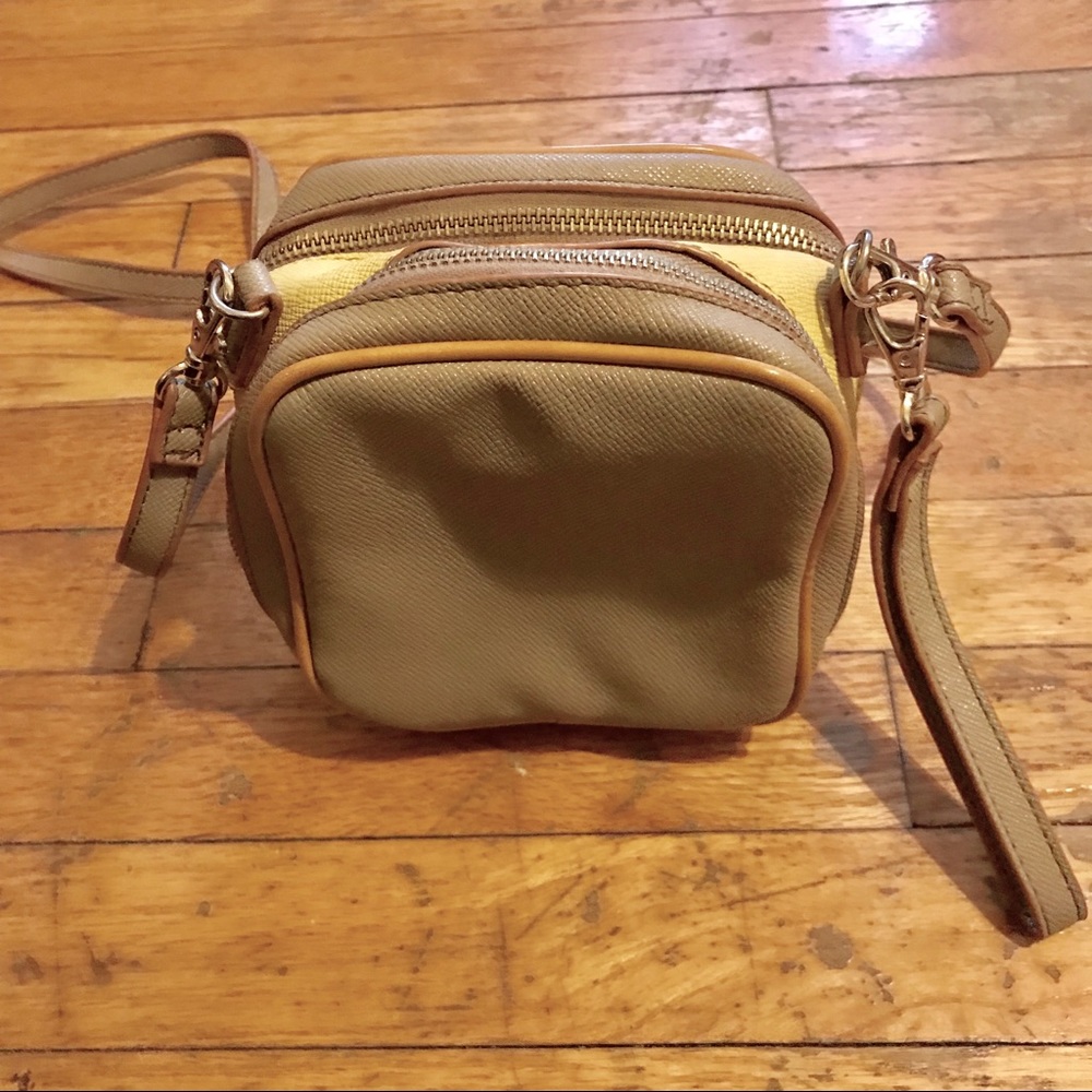 Compact cross body color block leather bag
